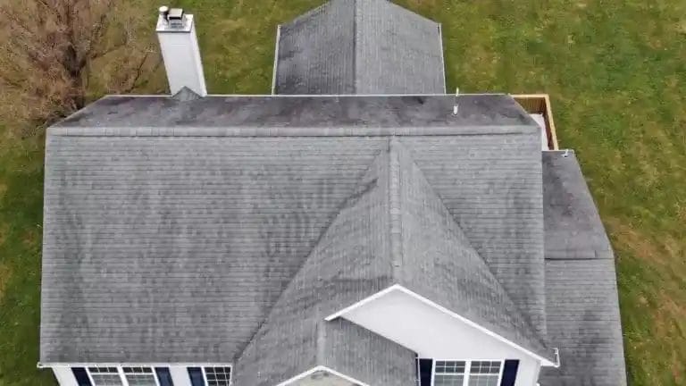 An aerial view of a gray roof on a home.