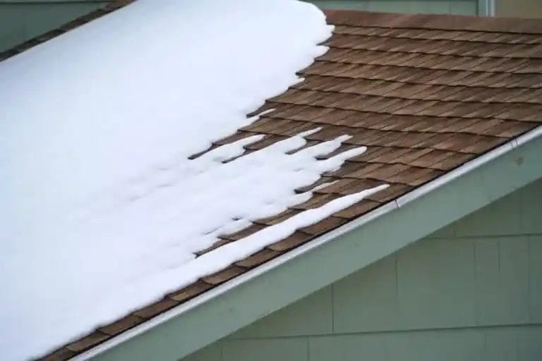 Snow melting on a residential roof