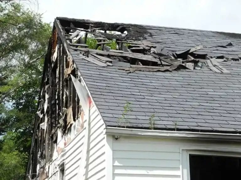 Fire damage on a roof. If your roof suffers damage in a fire, seek emergency roof repair.