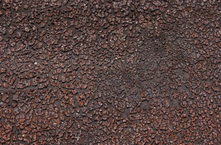 An asphalt shingle roof with granule loss