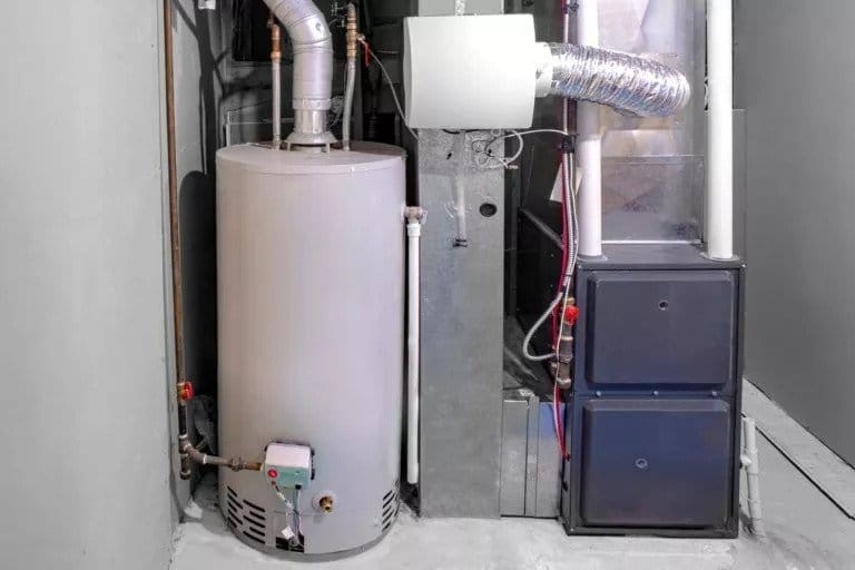 A furnance inside someone's home. A frequently running furnace is a sign that your home's insulation may need to be replaced.